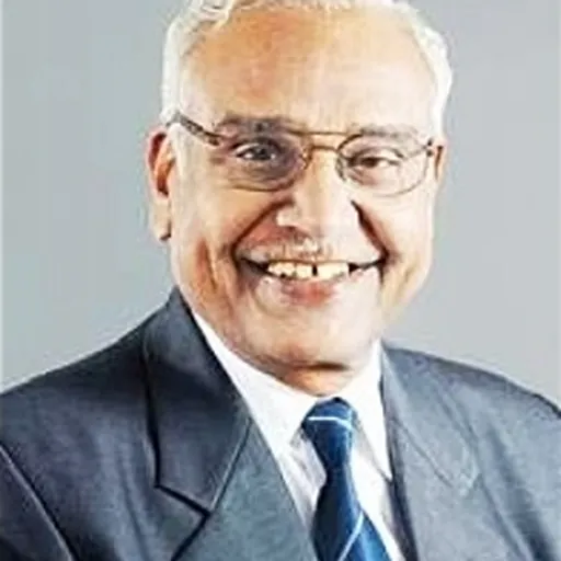 Portrait of Munirathna Anandakrishnan