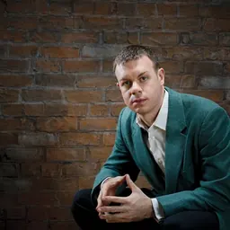 Portrait of Wayne Oquin