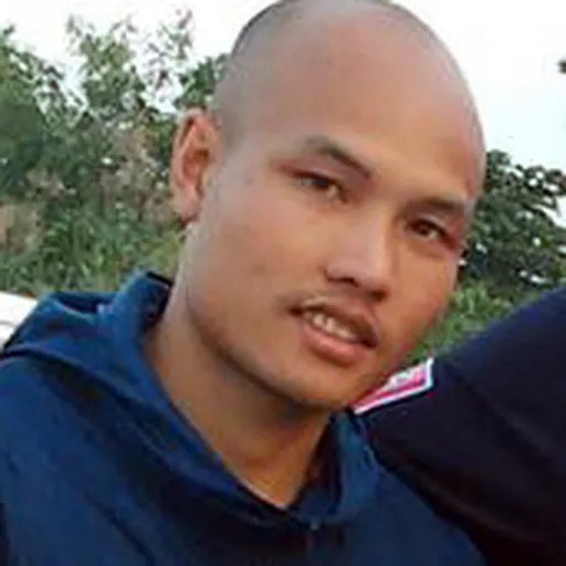 Portrait of Anusak Laosangthai