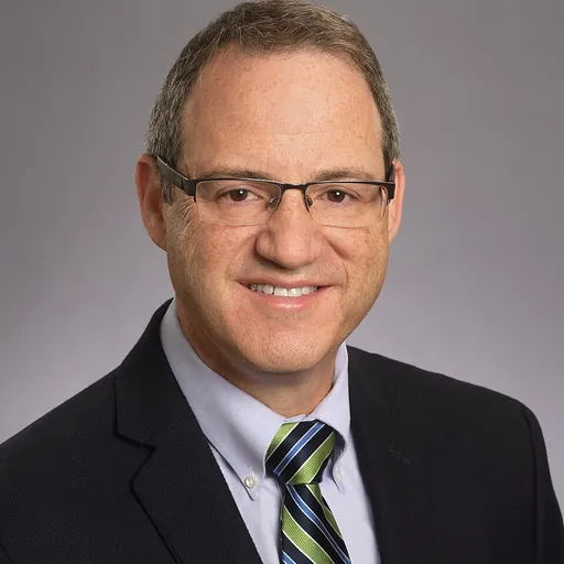 Portrait of Gary J Bassell