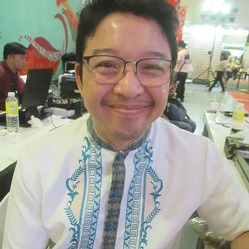 Portrait of RJ Ledesma