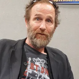 Portrait of Paul Kaye