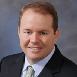 Portrait of Travis Cummings