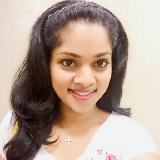 Portrait of Renu Joseph