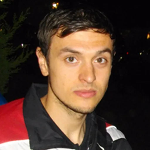 Portrait of Alex Nicholls