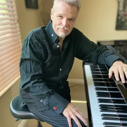 Portrait of Tom Schuman