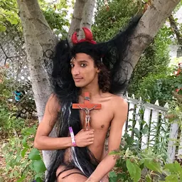 Portrait of Qween Amor