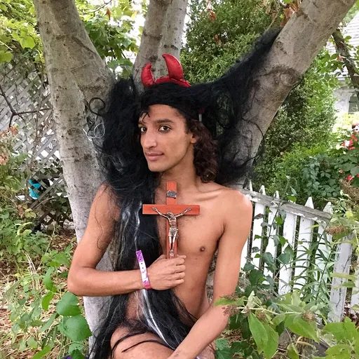 Portrait of Qween Amor