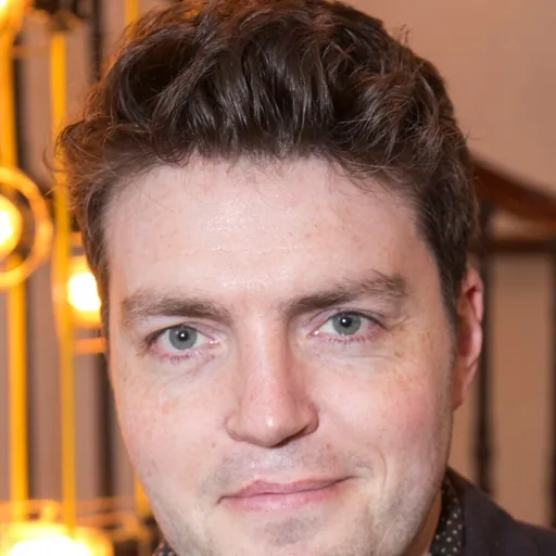 Portrait of Tom Burke