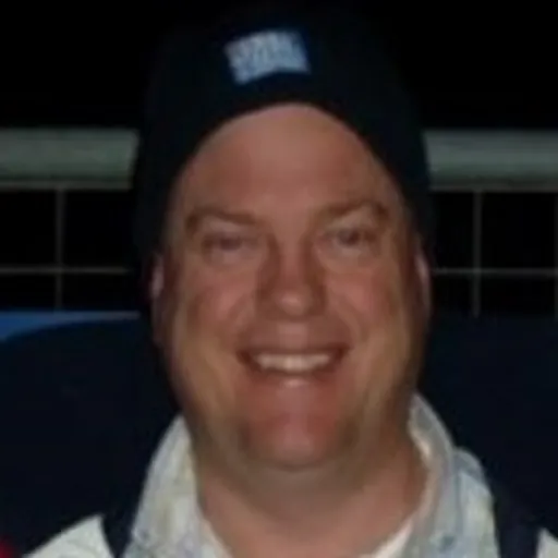 Portrait of Tim Nicholls