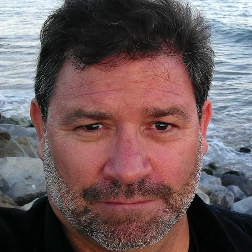 Portrait of John Craig Freeman