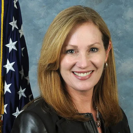 Portrait of Kimberly Poore Moser