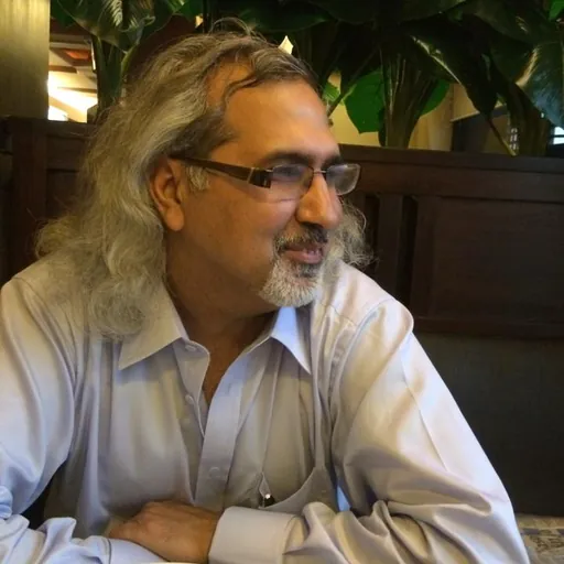 Portrait of Masood Ashraf Raja