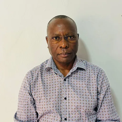 Portrait of Asan Kasingye