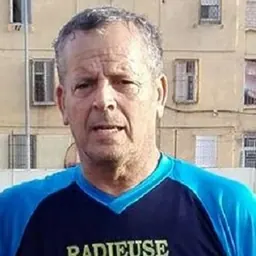 Portrait of Lakhdar Belloumi
