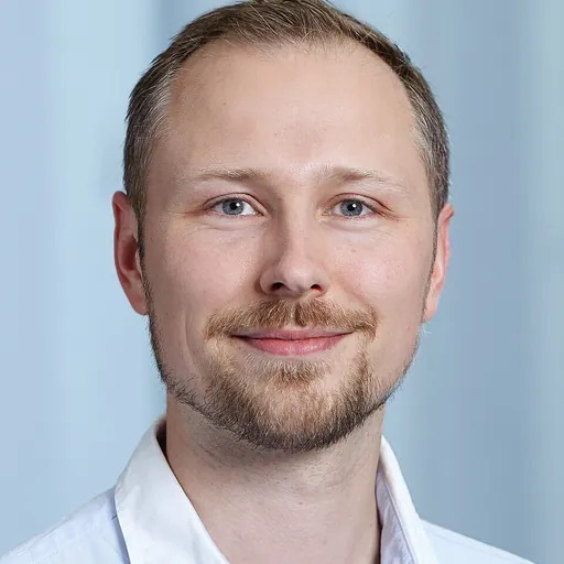 Portrait of Collin Y. Ewald