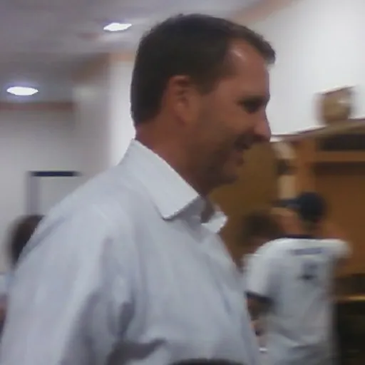 Portrait of Ty Detmer