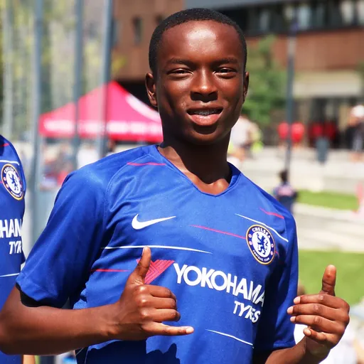 Portrait of Derrick Abu
