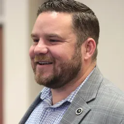 Portrait of RJ May