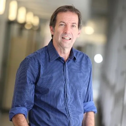 Portrait of John Quiggin