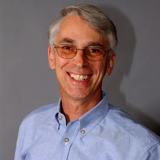 Portrait of Denis Evans