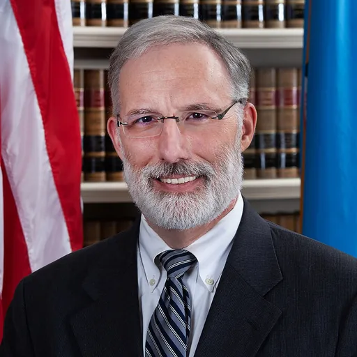 Portrait of J. Travis Laster