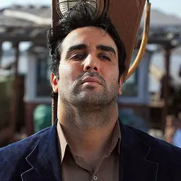Portrait of Pouria Poursorkh