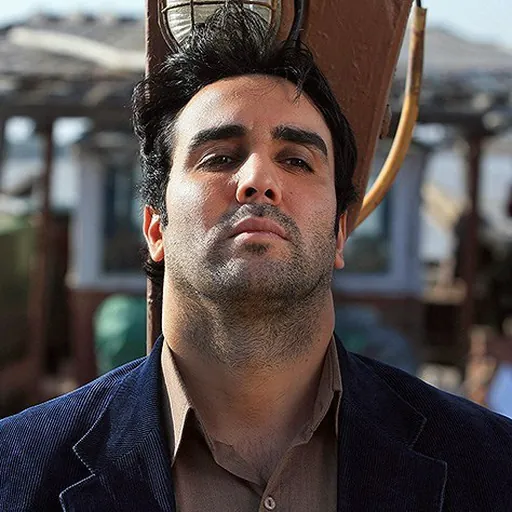 Portrait of Pouria Poursorkh