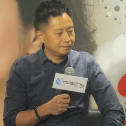 Portrait of Andrew Tuason