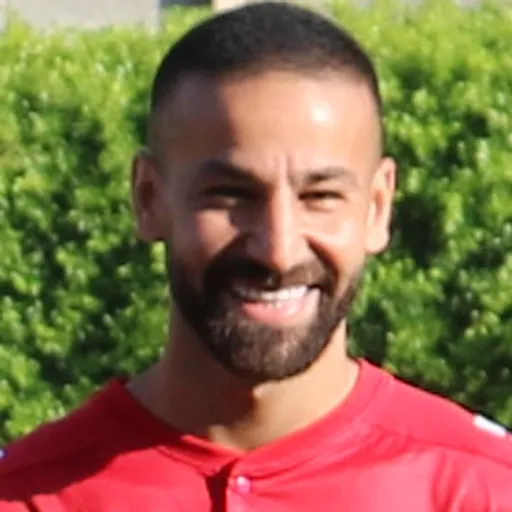 Portrait of Ali Tneich