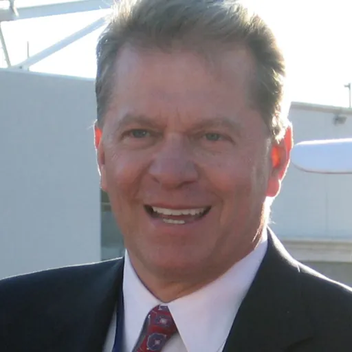 Portrait of Dave Checketts