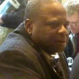 Portrait of Amos Adamu