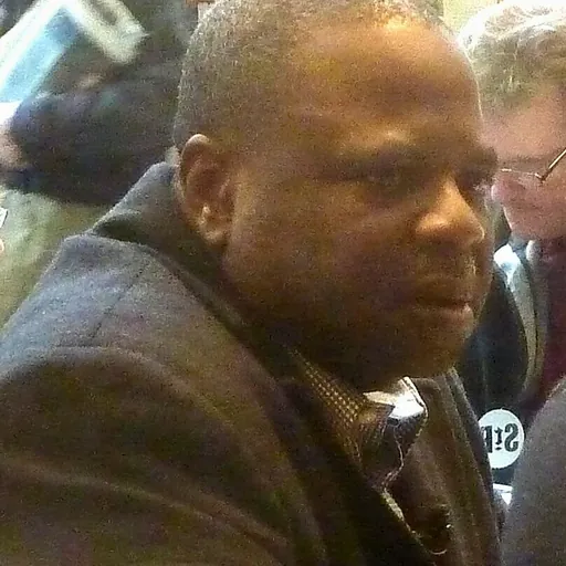 Portrait of Amos Adamu