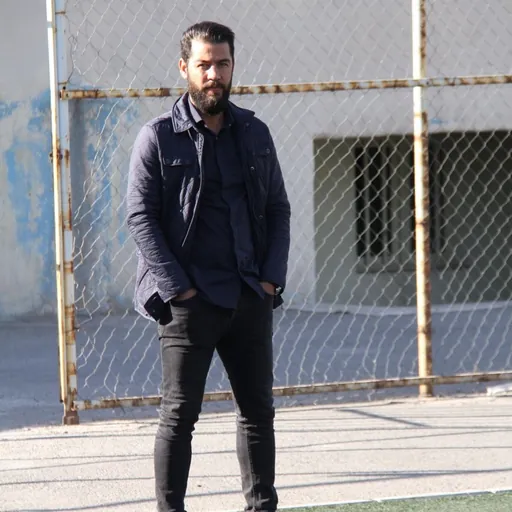 Portrait of Hossein Kazemi