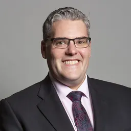 Portrait of Gavin Robinson