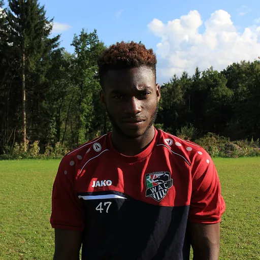 Portrait of Ash Kigbu