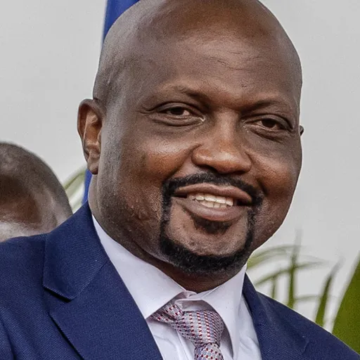 Portrait of Moses Kuria