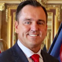 Portrait of Greg Hughes