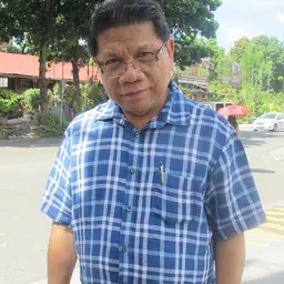 Portrait of Mike Enriquez