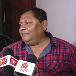 Portrait of Kharaj Mukherjee