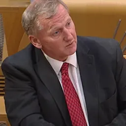Portrait of Alex Rowley