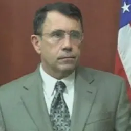 Portrait of Derek Harvey