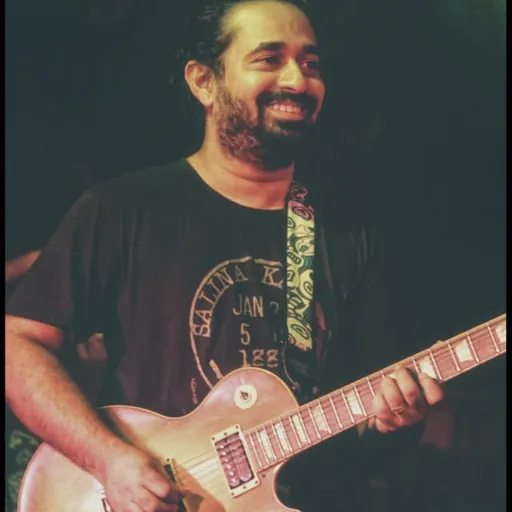 Portrait of Rex Vijayan