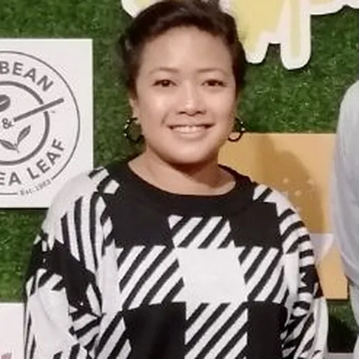 Portrait of Siti Kamaluddin