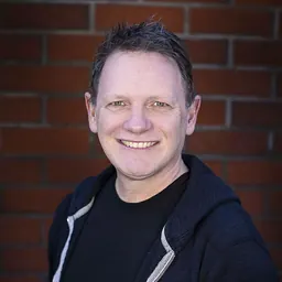 Portrait of Tim Clark