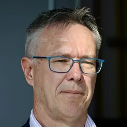 Portrait of Guy Debelle