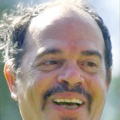 Portrait of Ticky Holgado