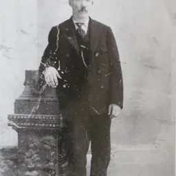 Portrait of George Curry