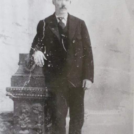 Portrait of George Curry