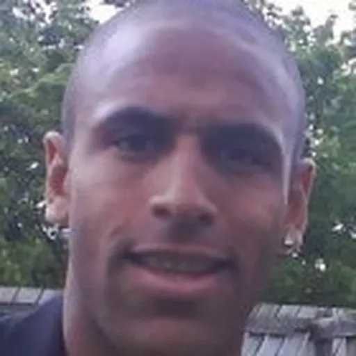 Portrait of Wayne Thomas